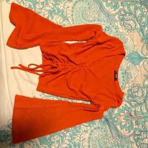 Orange long sleeve shirt